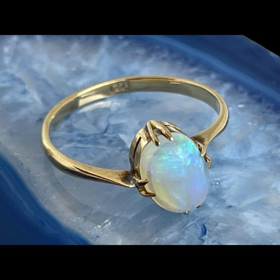 Photo of gold opal ring showing the 9ct hallmark to the inside band.