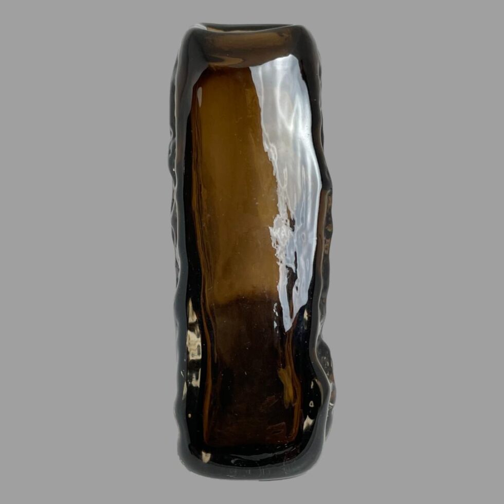 Photo of Whitefriars pyramid vase seen from the smooth side angle. This vase is slim line and would fit most window sills.