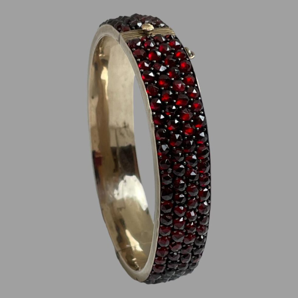 Photo of bracelet this time displayed standing upright with the clasp area at the top.