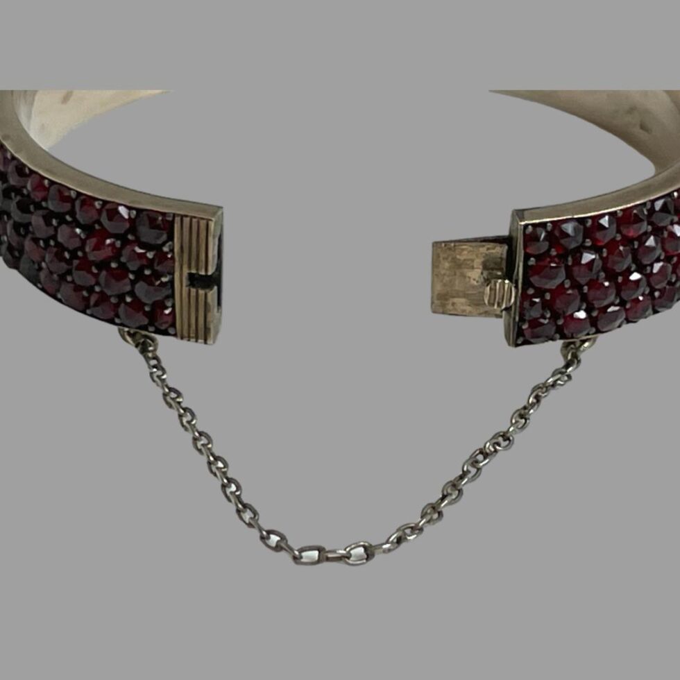 Close up of the clasp area showing the clasp undone and opened out slightly.