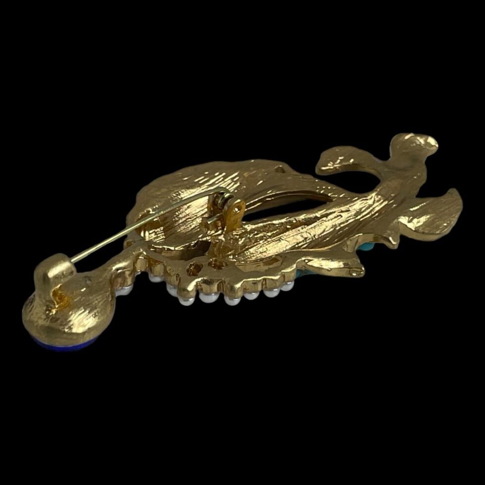 Photo of the back of the brooch with the pin closed. The closure is nice and solid for a good secure closure.