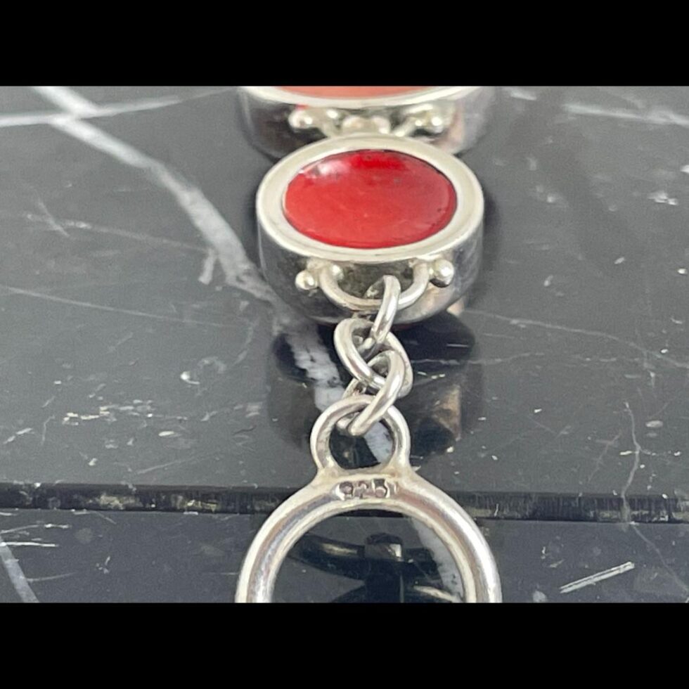 A close up photo of the 925 hallmark on one of the ring clasps.