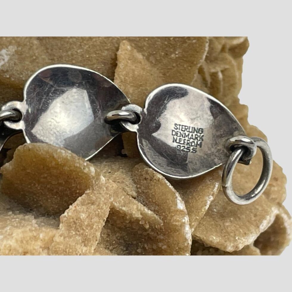 A close up photo of the hallmark which reads Sterling Denmark N.E.From 925S