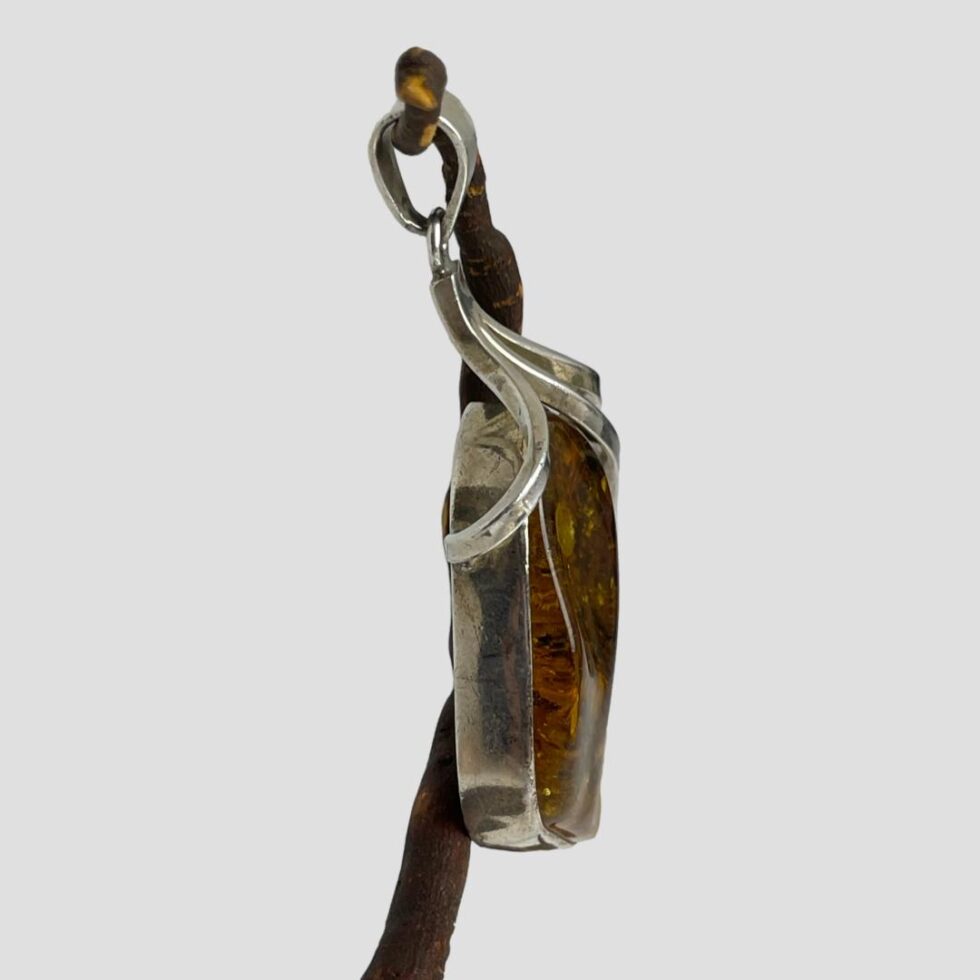 Photo of pendant seen from a side angle to show the depth.