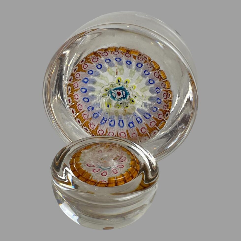 Photo of the base of both lid and bottle. The bottle has a pontil which is where the glass is cut from being handblown. The lid looks as though it has a pontil too but alas it is where the stopper has broken off. Although jagged looking, it has been smoothed off to a degree so not sharp to touch.