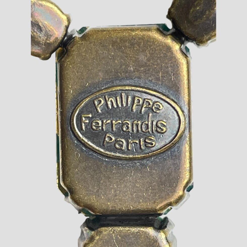 Close up photo of the makers mark on the back of the pendant area reading Philippe Ferrandis Paris