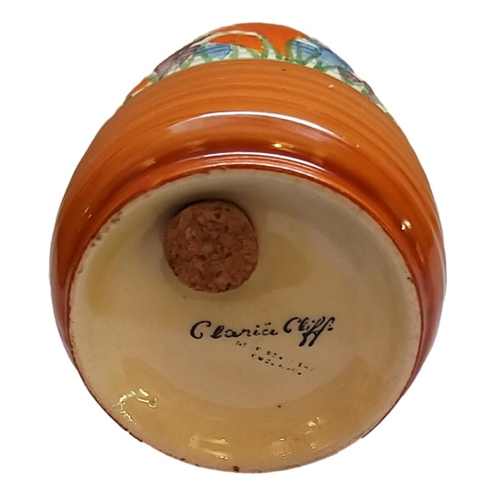 Photo of the base of the Lynton sugar sifter showing the Clarice Cliff signature mark.