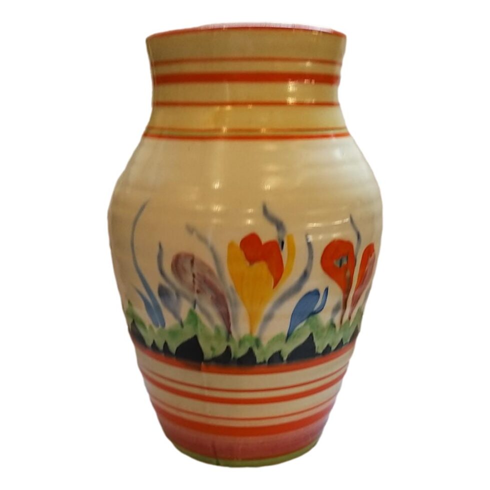 Photo of one other area of vase this one has blue, orange, yellow and a lilac coloured crocus.