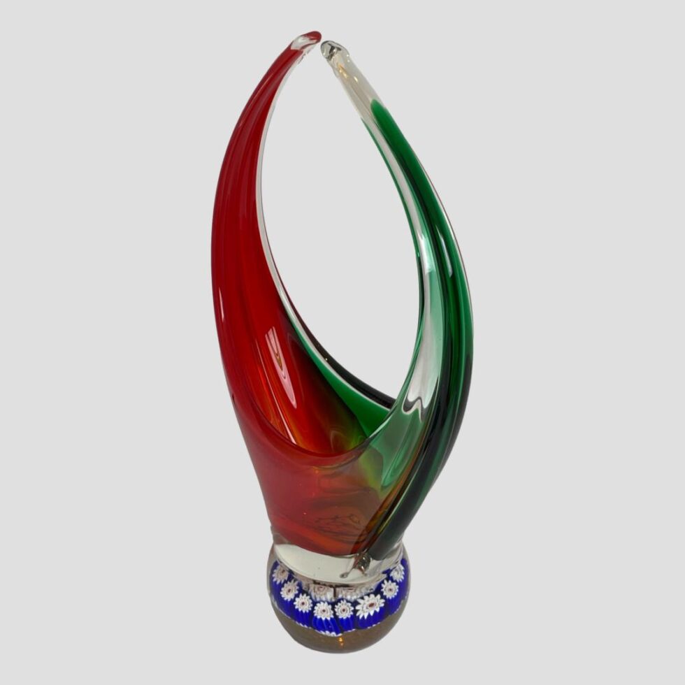 Photo of basket turned slightly round to be diagonally across the page with green handle side in the bottom right corner.