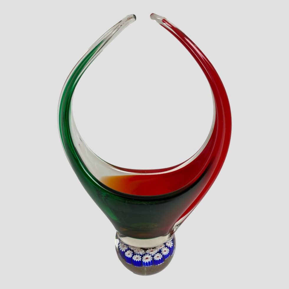 Photo of Murano basket seen again from the side this time with the red handle on the right. Strangely, the basket looks wider from this side!