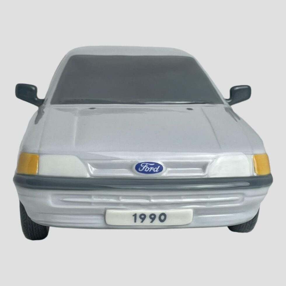 Photo looking straight at the front of Lladro Ford Escort.