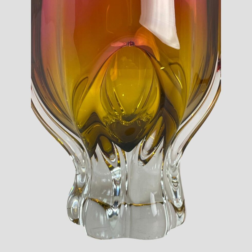 Close up photo of the base area of the Josef Hospodka vase where clear glass is at the base merging into amber.