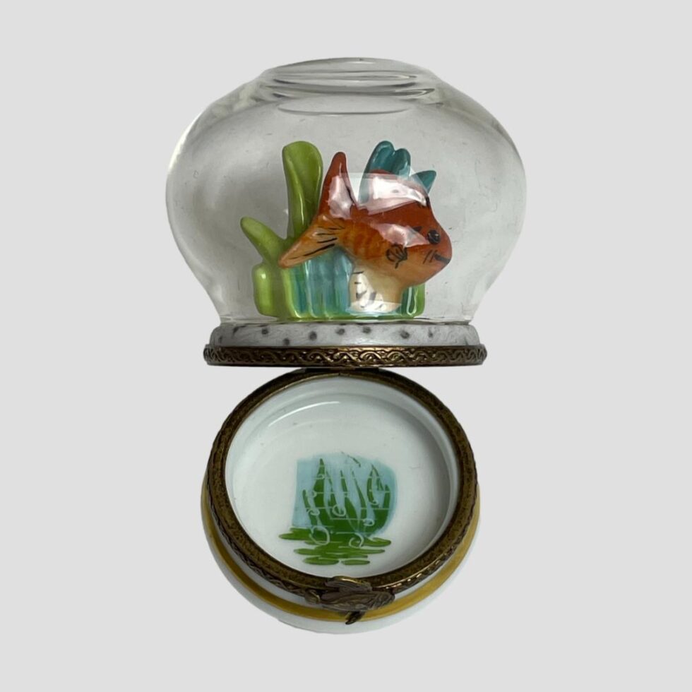 Photo of Limoges goldfish bowl box displayed open from the front. The top with the bowl is back and the inside of the box reveals the hidden seaweed beneath.