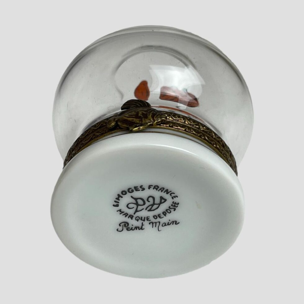 Photo of the base of the Limoges fish bowl box showing the Limoges mark.