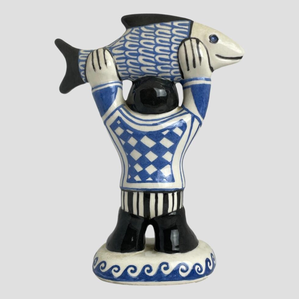 Back view of the fisherman and fish.