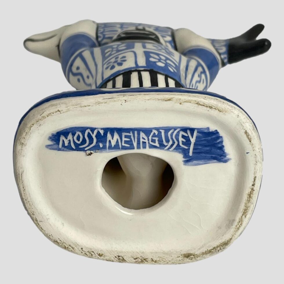 Photo of the base of the fisherman showing the makers mark and location ; Moss Mevagissey