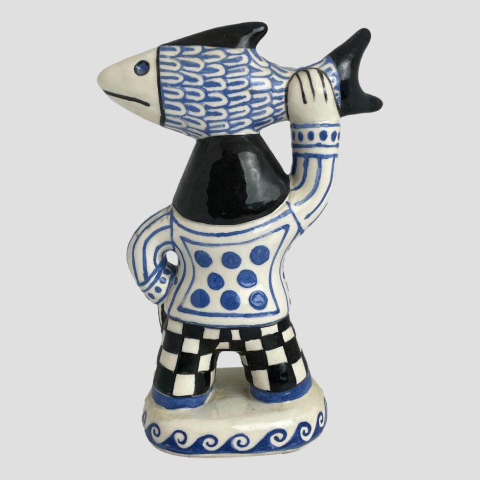 Photo of the back of Bernard Moss fisherwoman.