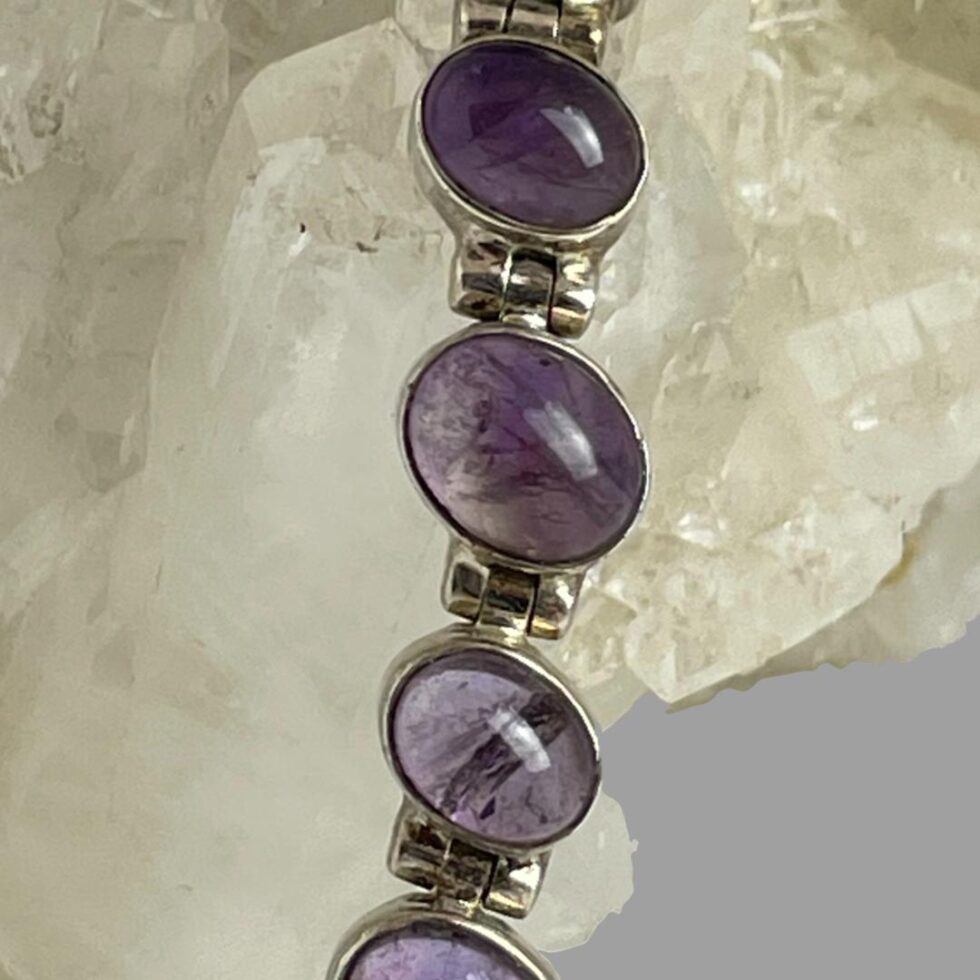 A close up photo of some of the amethyst cabochons.