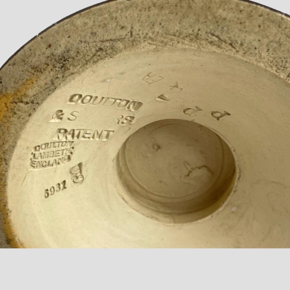 Close up photo of the Royal Doulton imprints on the base of the vase.