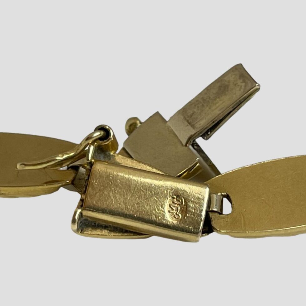 Close up photo of the hallmarks on the clasp areas.