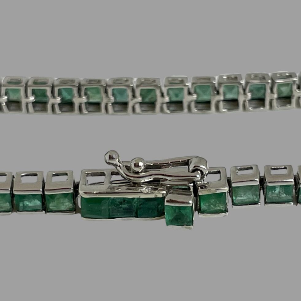 Close up photo of the clasp area shown fully closed with safety catch in place also.