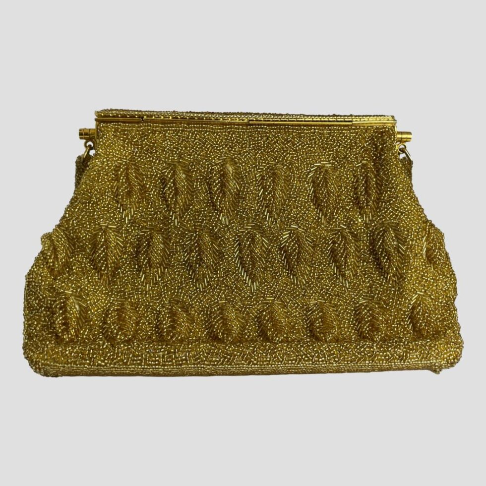 Photo of the back of the gold beaded with the same leaf design as front in gold bead.