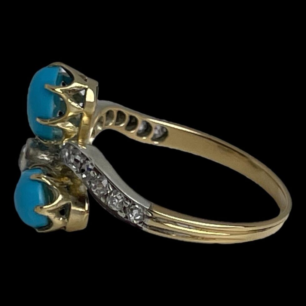 Photo of ring displayed on a flat surface with the ring front facing straight left.