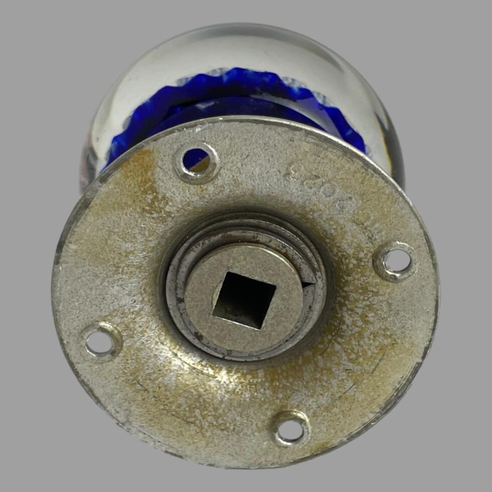 Photo of the back of the metal door fixing.