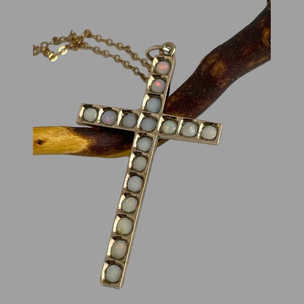 Photo of the back of the cross showing the setting of the opals.
