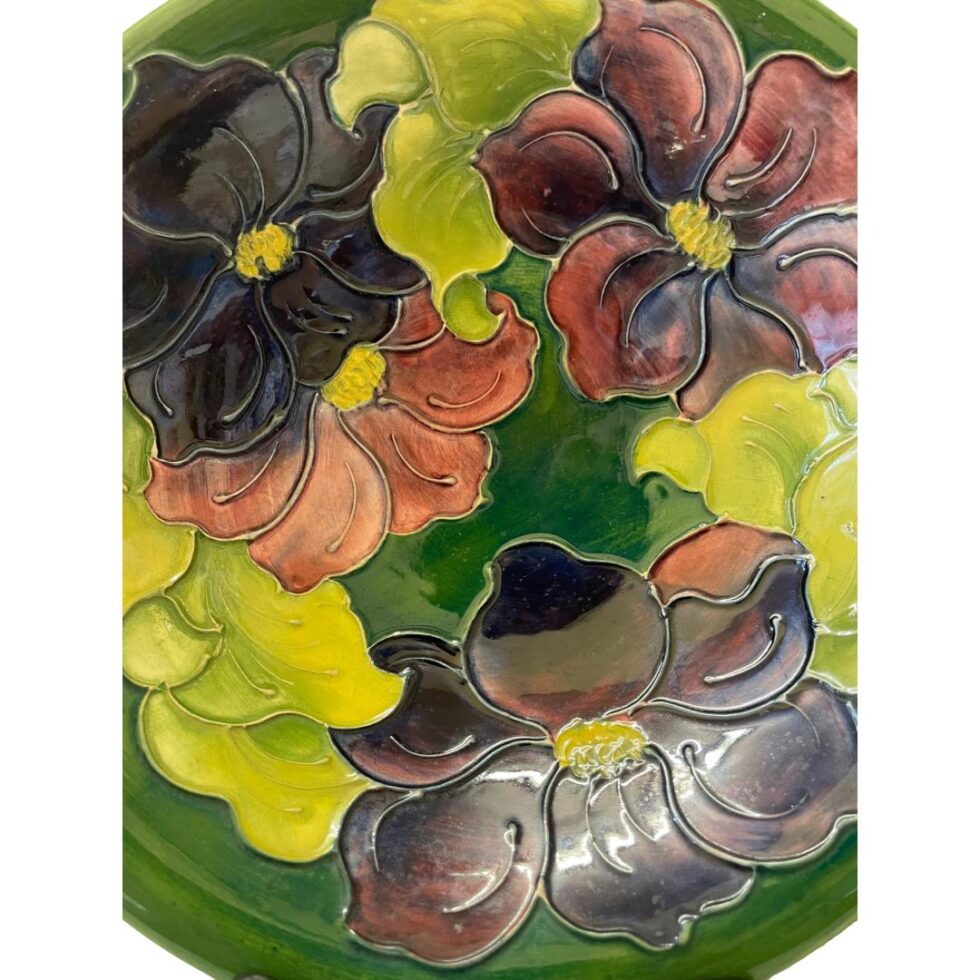 Close up photo of the clematis flowers adorning this large Moorcroft clematis bowl.