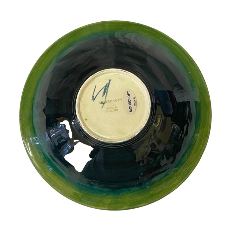 Photo of the base of the large Moorcroft clematis bowl displaying the Moorcroft stamp and WM initials of Walter Moorcroft.