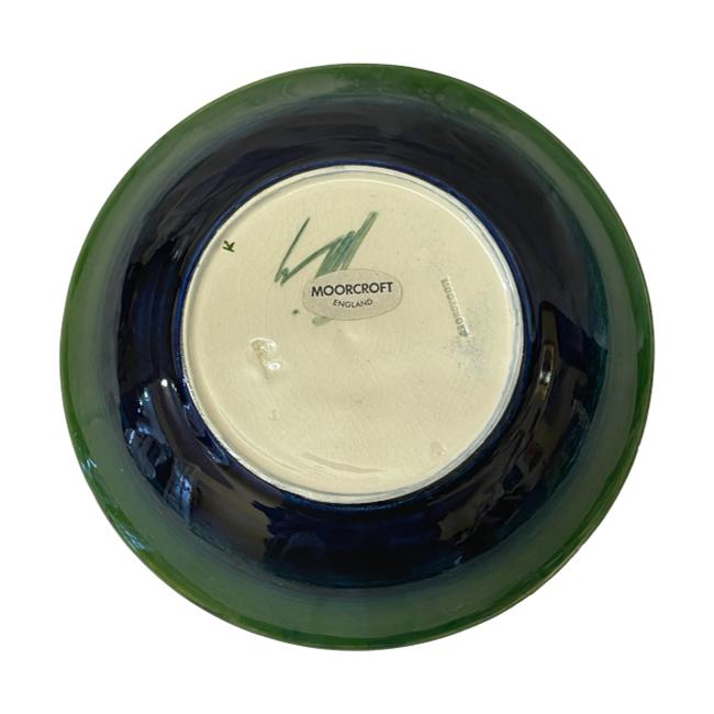 Photo of the base of Moorcroft shallow bowl showing the Moorcroft stamp and Walter Moorcroft's initials.