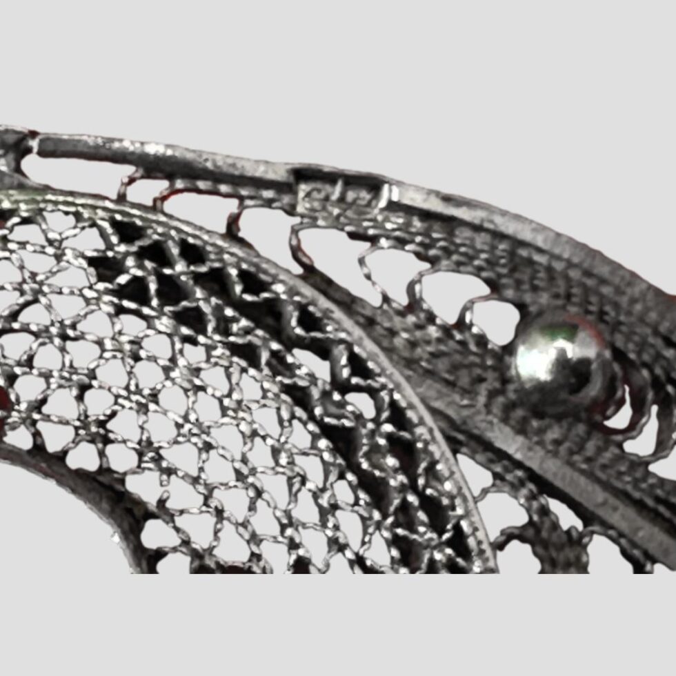 A close up photo of one of the hallmarks at the back of one panel.