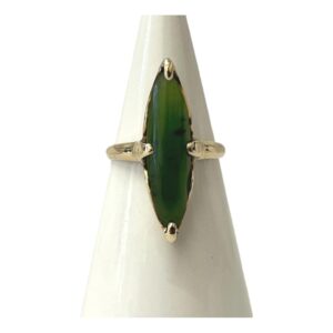 Main photo of 10kt gold jade ring displayed on a white cone shaped stand with the ring front forward facing. The jade is a lovely shade of apple green with some flecks included and is set vertically so a long thin ring which would suit long slender fingers.