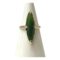 Main photo of 10kt gold jade ring displayed on a white cone shaped stand with the ring front forward facing. The jade is a lovely shade of apple green with some flecks included and is set vertically so a long thin ring which would suit long slender fingers.