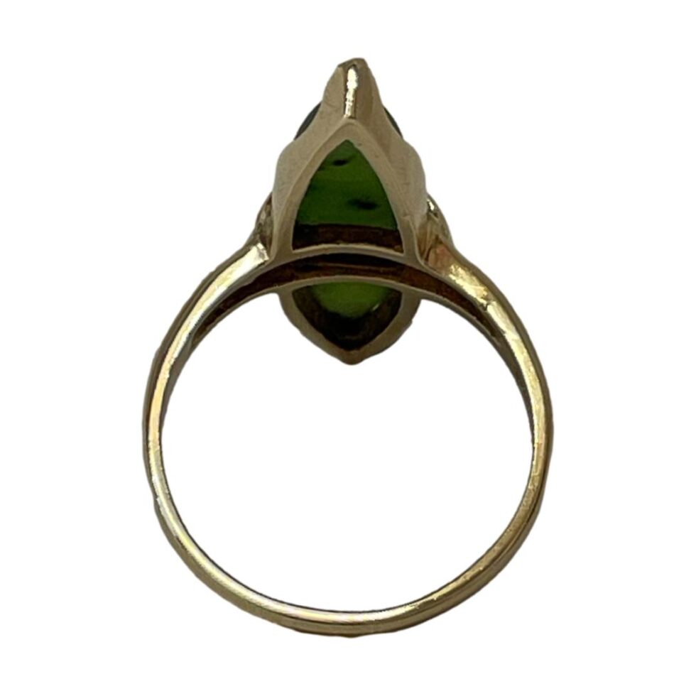 Photo of 10kt gold jade ring seen from the back showing the stone setting.