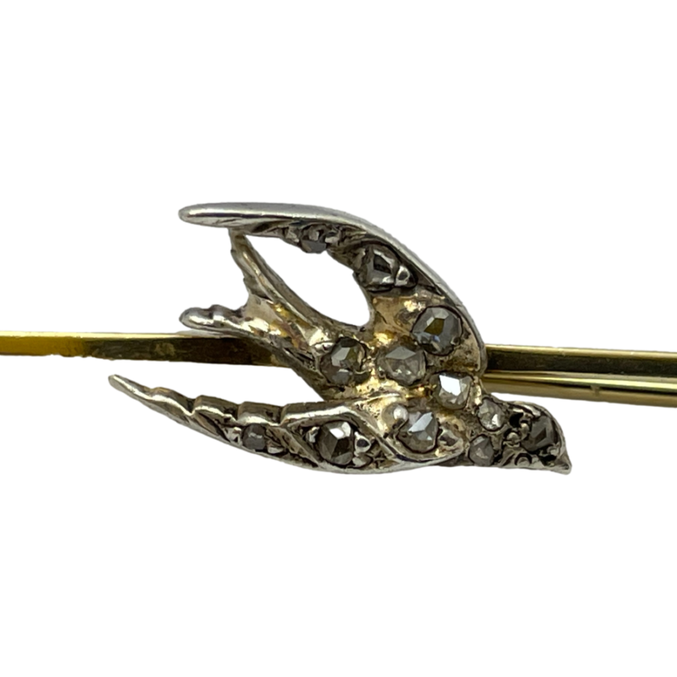 Close up photo of the diamond encrusted swallow. The rose cut diamonds add extra sparkle to this antique piece of Edwardian jewellery.