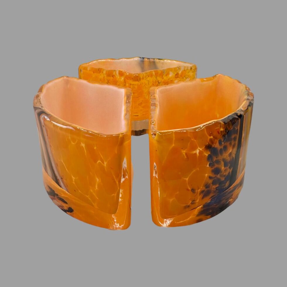 Photo of the 3 segments displayed in a circle but slightly apart from each other so a broken circle.