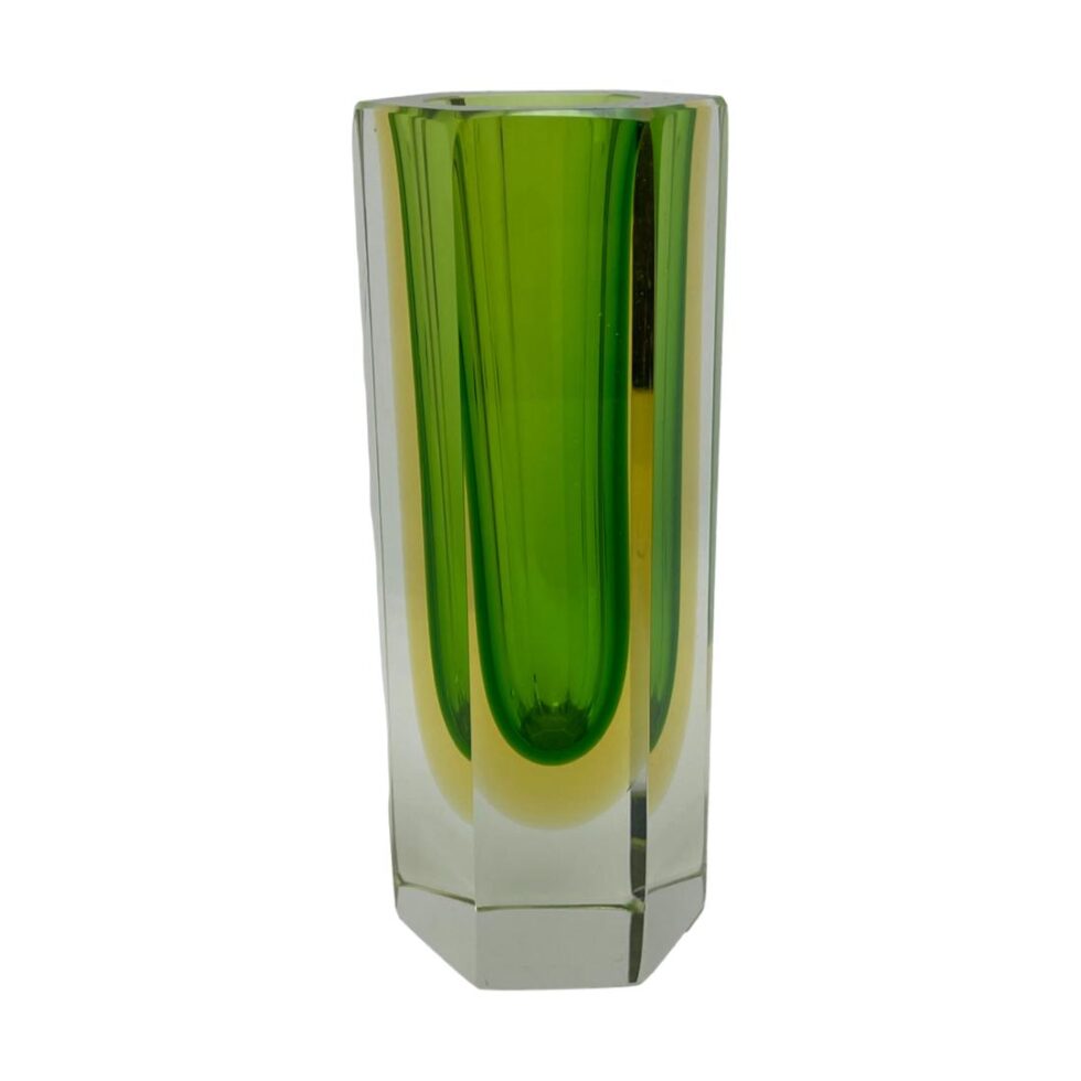 Photo of Mid Century Sommerso vase from another eye level angle where the colours within look fragmented.