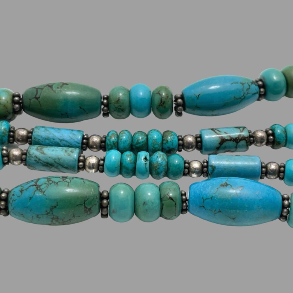 A close up photo of some of the beautiful and varied turquoise beads.