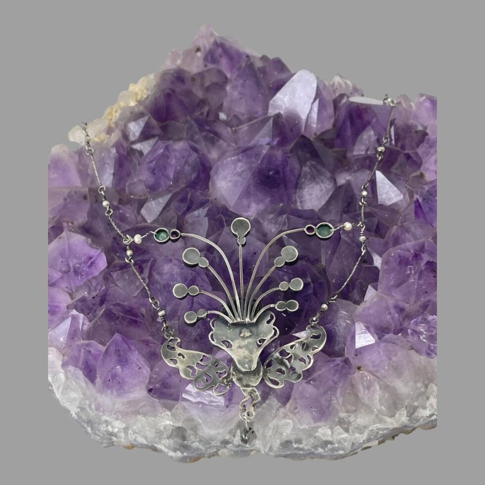 Photo of peacock area of necklace this time showing the back and all the intricate work that has gone into the creation of this incredible piece of antique jewellery.