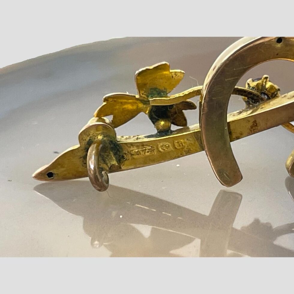 Close up photo of the full hallmark on the back bar at the left.