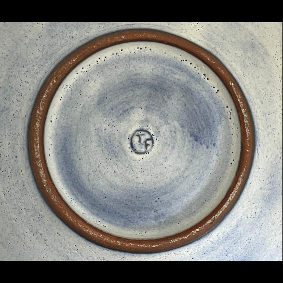 Close up photo of the TF initials at the base of the bowl.