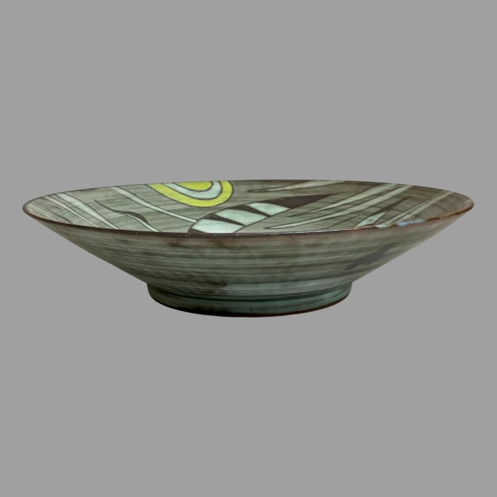 Photo of large flying cranes bowl seen from a near eye level laid flat to show the depth. This bowl could be used to store fruit or vegetables but not too much as to block the art!
