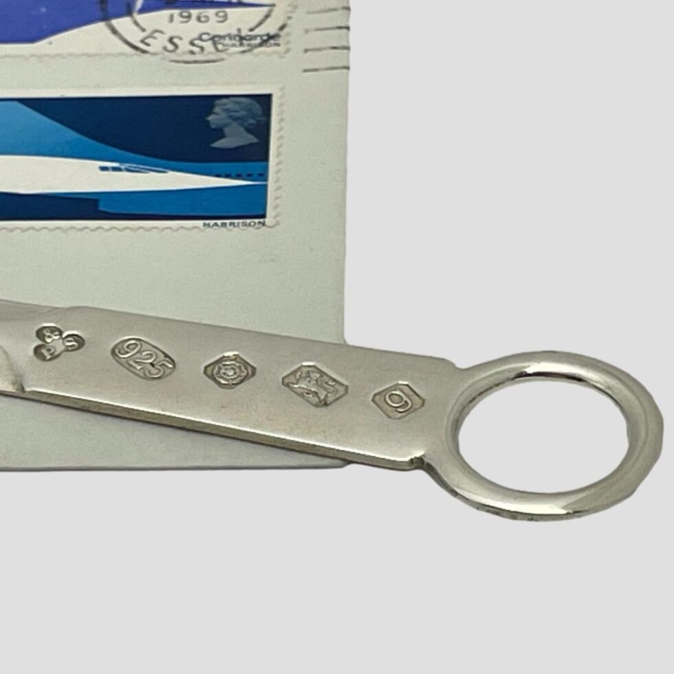 A close up photo of the full hallmark at handle end.