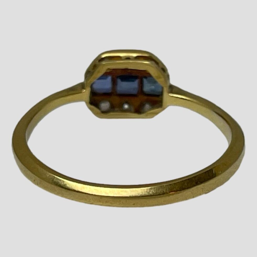 Photo of the back of ring showing the setting for the stones.