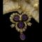 Main photo of gold pendant brooch &chain displayed leaning against a section of starfish (looks like seeded bread) and with no light shining. The amethysts are coloured a rich dark purple. The main body of the pendant or brooch is like an upside down club playing card suit with seed pearls all around the outer frame. At the centre, there is a single round cut diamond which then has 3 oval cut amethysts attached each housed within the space of the club. A single oval cut amethyst hangs below and 3 tulip shaped gold segments protrude from the dips of the club shape each with a seed pearl to the centre.