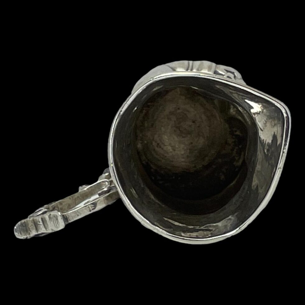 Photo looking straight down into the top of the jug showing the darkened interior.