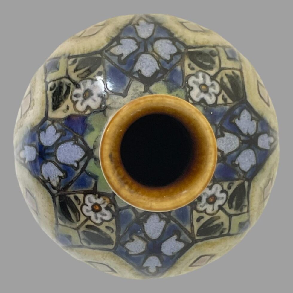 A photo of the Ada Tosen vase looking straight down from above into the mouth. The decorations around the bulbous bottom can be seen all around the mouth area.