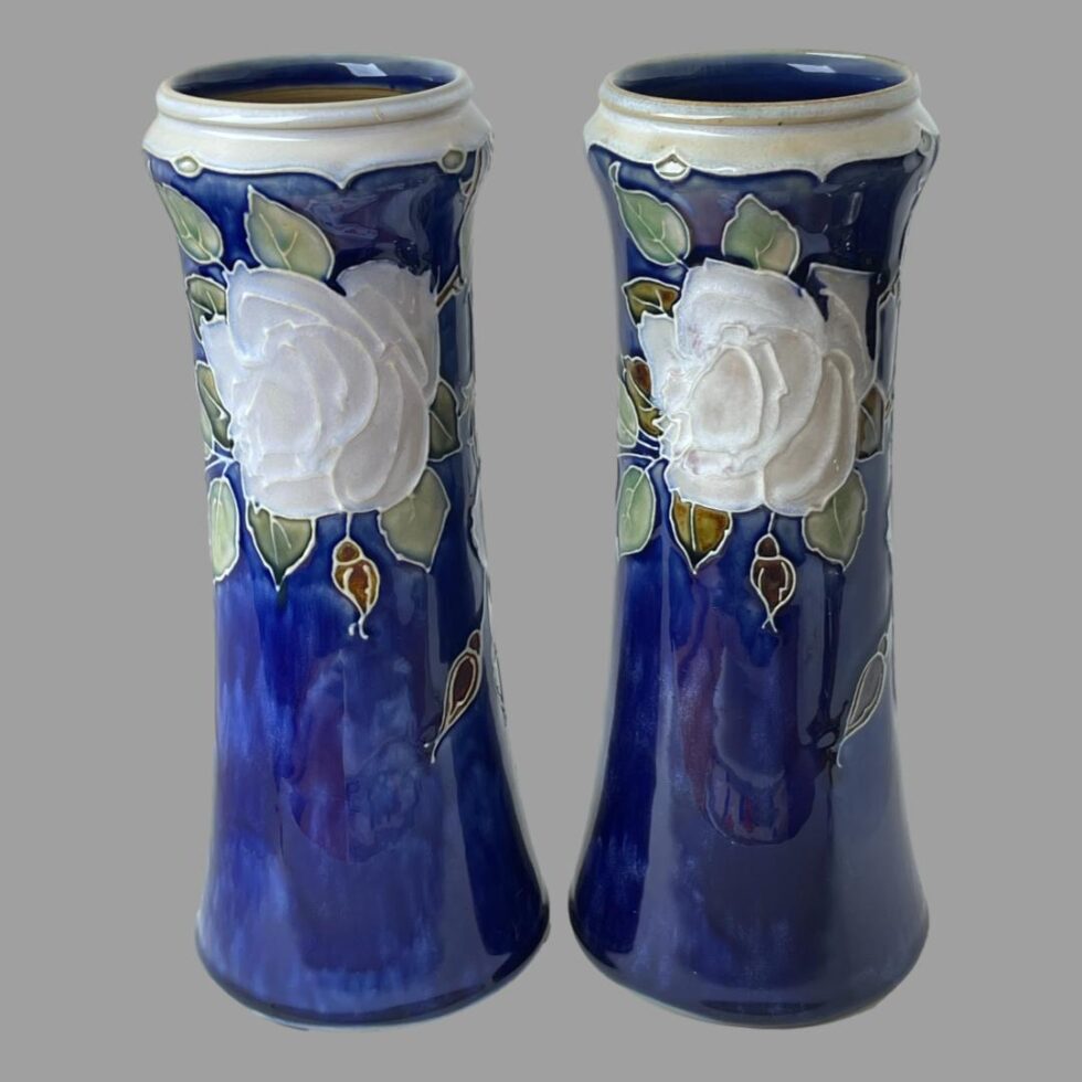 Photo of both tall Doulton vases this time with the higher rose sides on display. Again, no 2 pieces are ever the same and minor differences can be seen.